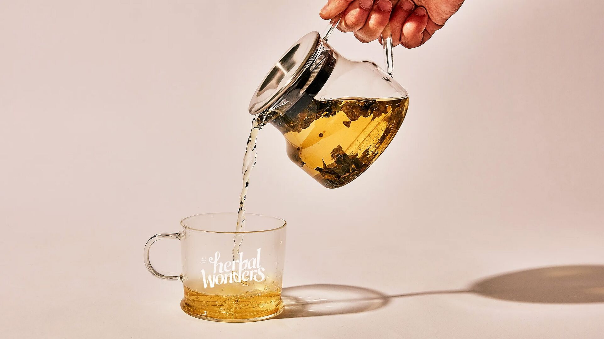 Herbal Wonders tea being poured outdoors